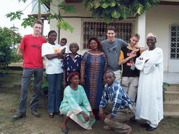 Tim and his friends in front of the chicken farmer`s house