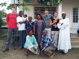 Tim and his friends in front of the chicken farmer`s house