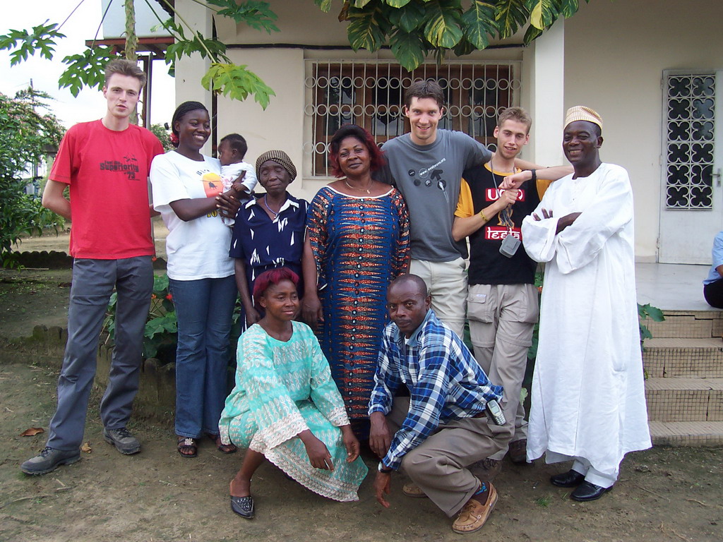 Tim and his friends in front of the chicken farmer`s house