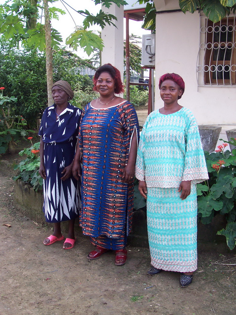 Our friends in front of the chicken farmer`s house