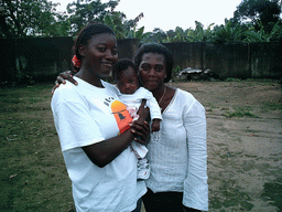 Our friends in front of the chicken farmer`s house