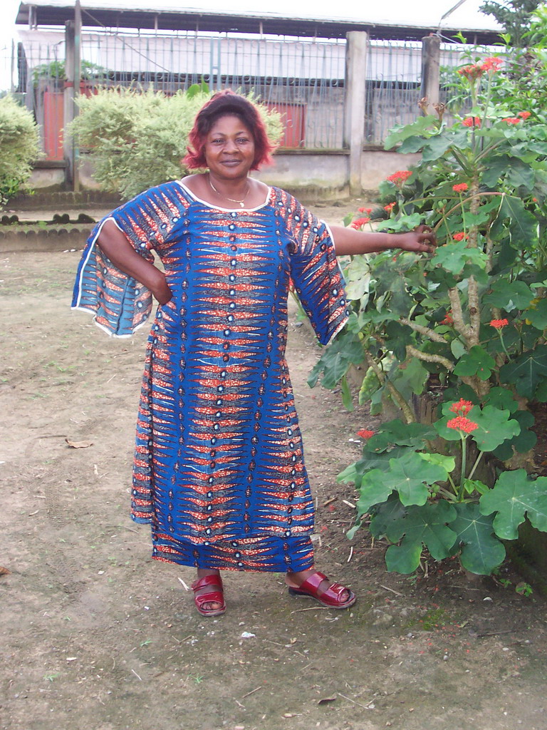 Our friend in front of the chicken farmer`s house