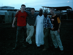 Tim and his friends at a square, at sunset