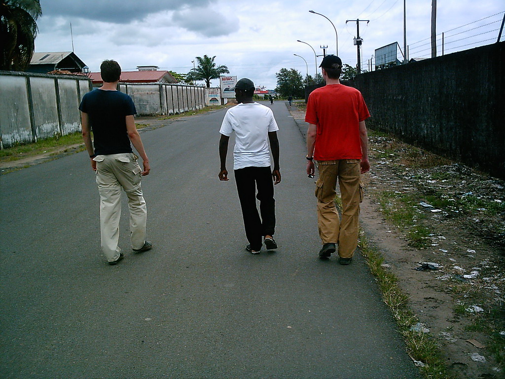 Tim and his friends on a street near our friend`s house