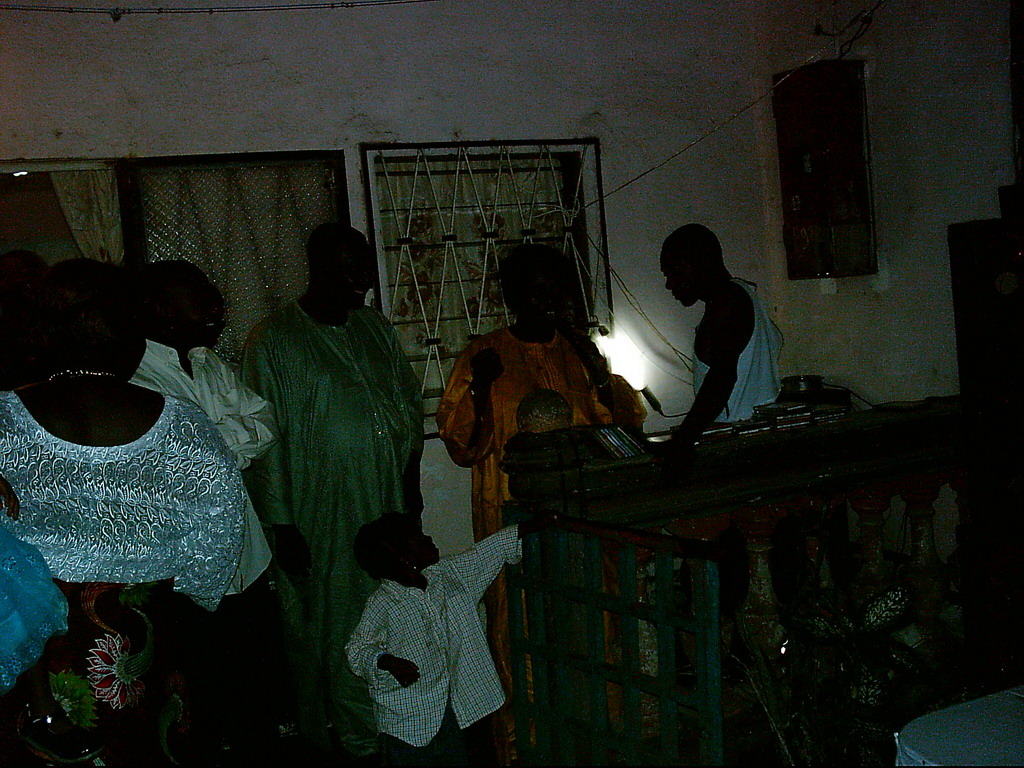 People making music at a party at the Bonabéri port