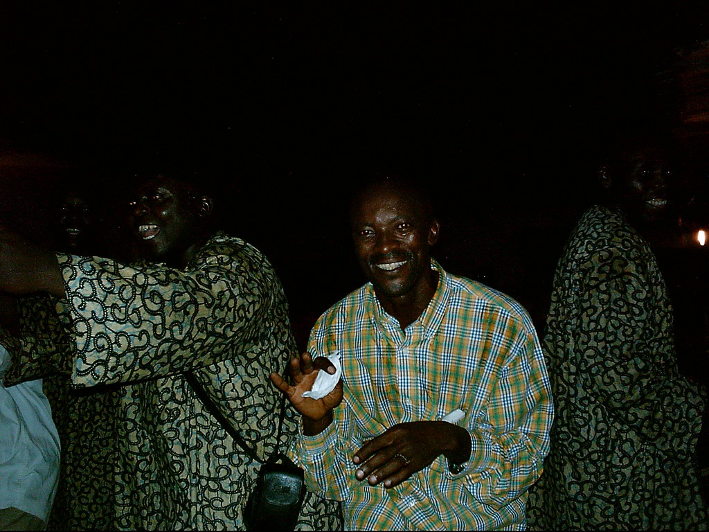 People dancing at a party at the Bonabéri port