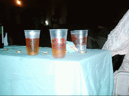 Plastic cups with beer at a party at the Bonabéri port