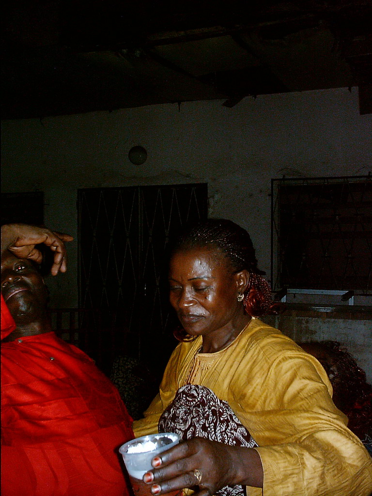 People dancing at a party at the Bonabéri port