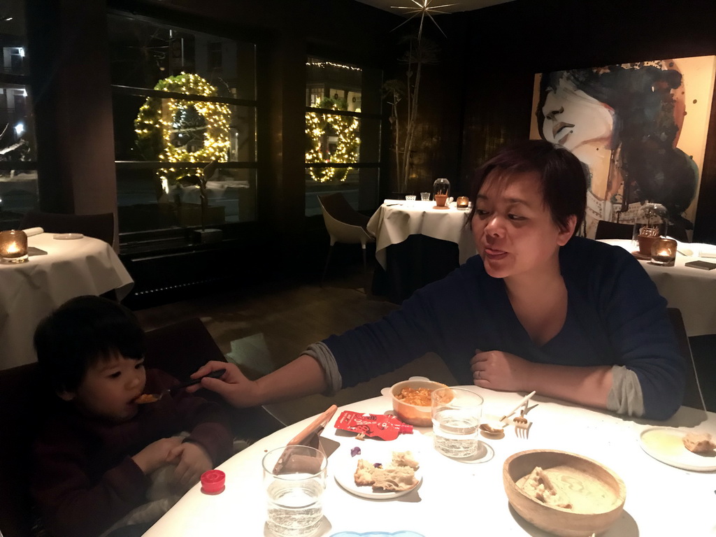 Miaomiao feeding Max at the La Provence restaurant