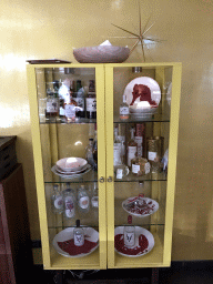 Closet with tableware and bottles at the La Provence restaurant