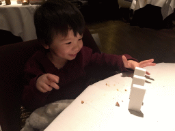 Max playing with tableware at the La Provence restaurant