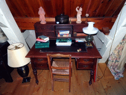 Desk with books in the Kwikstaartkamer room at the upper floor of Castle Sterkenburg