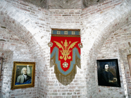 Banner and paintings in the Torenvalkkamer room in the Tower of Castle Sterkenburg