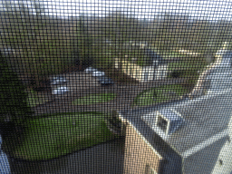 Parking place and Koetshuis building of Castle Sterkenburg, viewed from the Uilenkamer room in the Tower