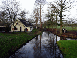 Castle moat, Tuinmanshuis building and chicken coop of Castle Sterkenburg, viewed from the access bridge