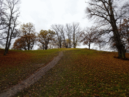 Hill with a statue at the west side of the Garden of Drottningholm Palace