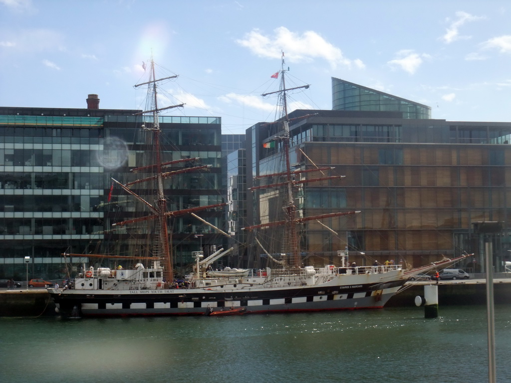 Boat on the Liffey river, viewed from the Airline Express bus from the airport