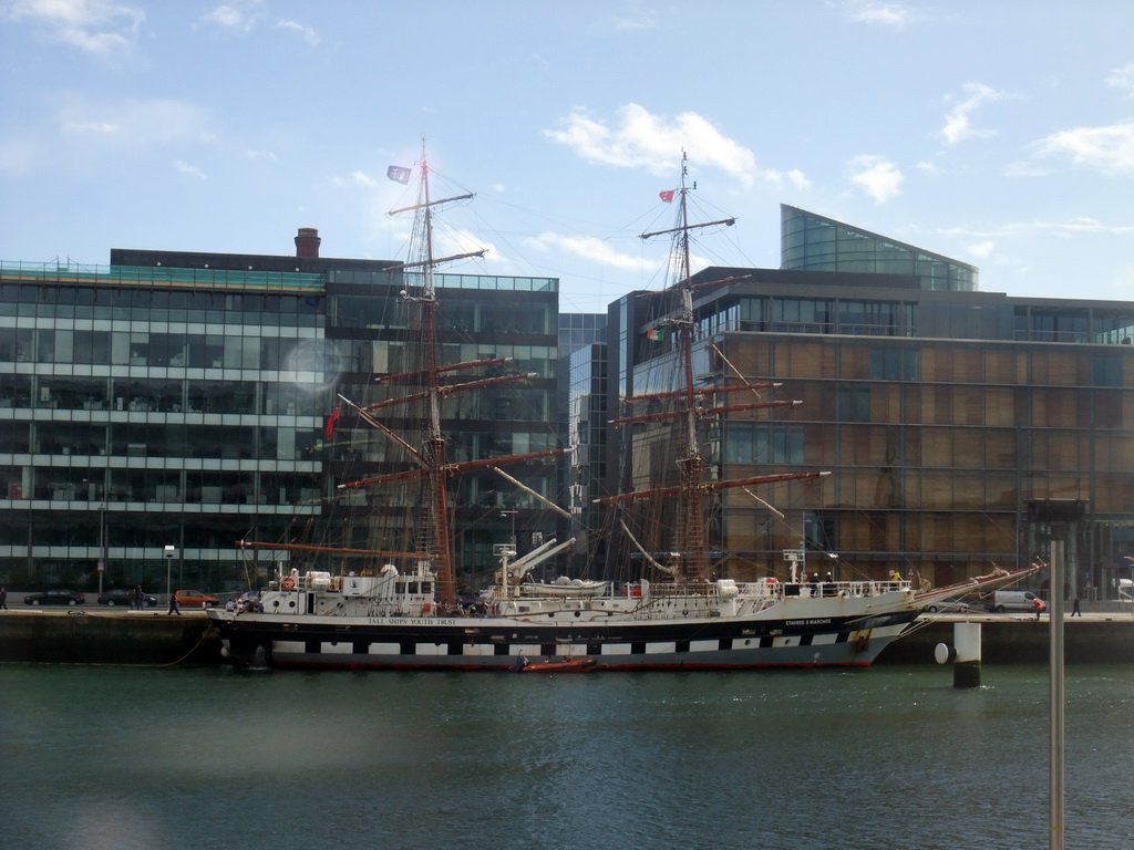 Boat on the Liffey river, viewed from the Airline Express bus from the airport