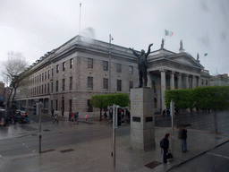 Statue of Jim Larkin and the General Post Office at O`Connell Street, viewed from the Airline Express bus from the airport