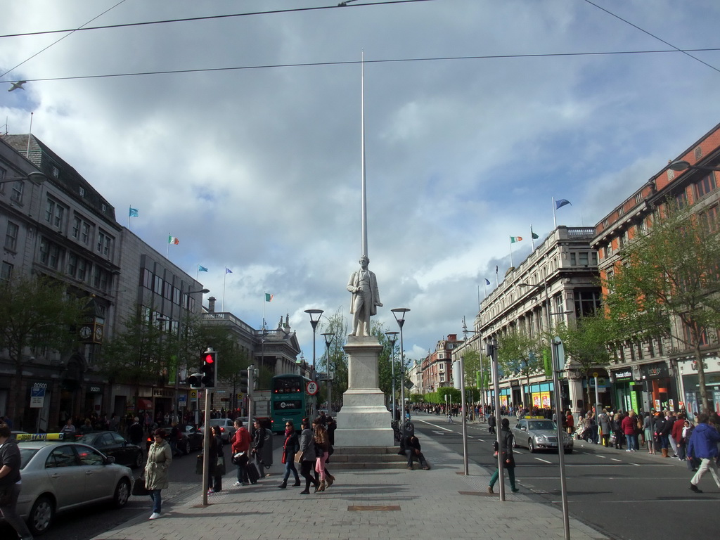 Statue of William Smith O`Brien and the Spire at O`Connell Street