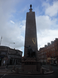 The Charles Stewart Parnell Monument and the Ambassador Theatre at the crossing of O`Connell Street and Parnell Street