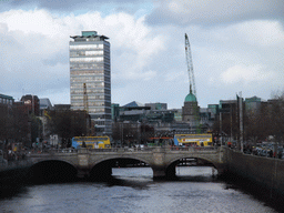 View from the Ha`penny Bridge over the O`Connell Bridge over the Liffey river, the Liberty Hall and the Custom House