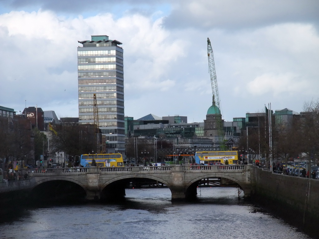 View from the Ha`penny Bridge over the O`Connell Bridge over the Liffey river, the Liberty Hall and the Custom House