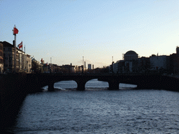 View from the Millennium Bridge over the Capel Street Bridge over the Liffey river, and the Supreme Court of Ireland