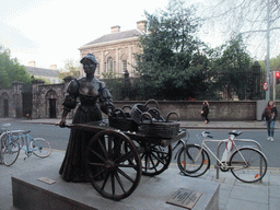 Statue of Molly Malone in Grafton Street, and the front of the Provost`s House of Trinity College Dublin