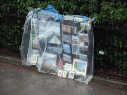 Paintings and drawings covered in plastic at the northern side of St. Stephen`s Green, viewed from the sightseeing bus