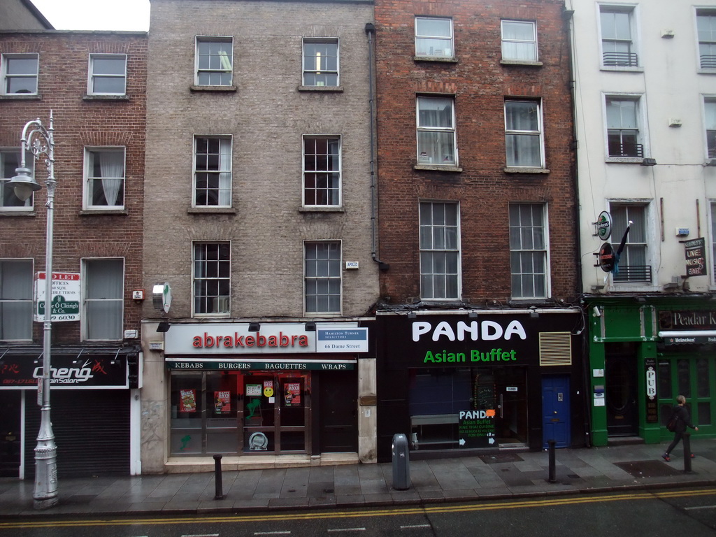 Shops and restaurants in Dame Street, viewed from the sightseeing bus