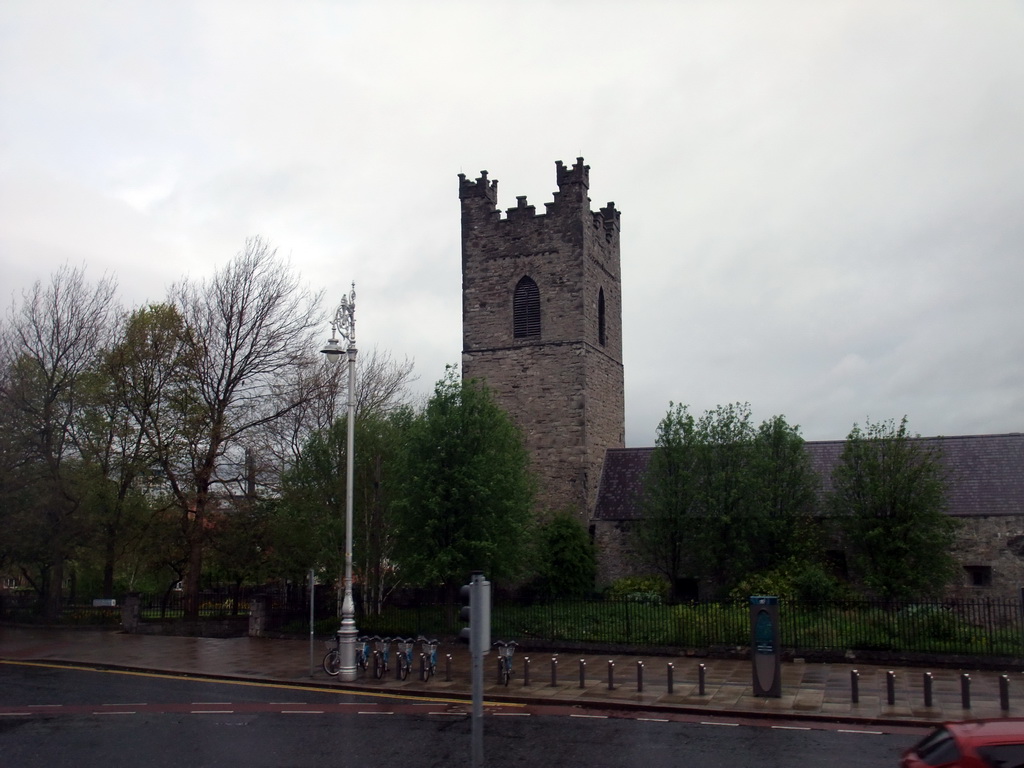 Tower of St. Audoen`s Catholic Church at High Street, viewed from the sightseeing bus