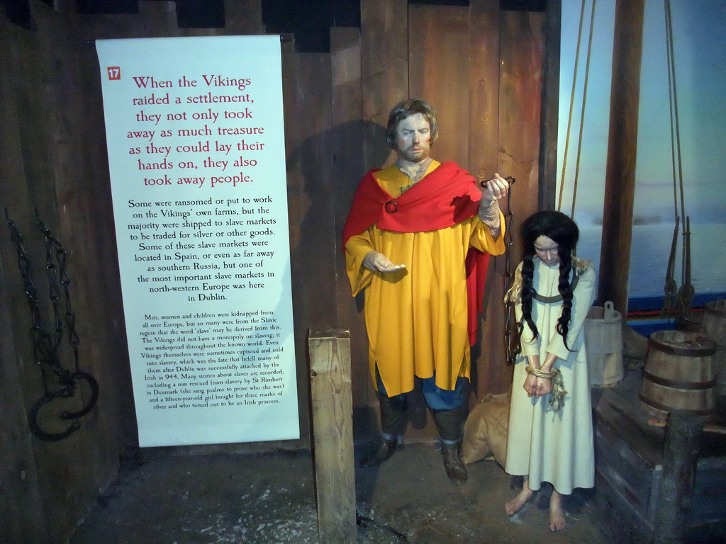 Wax statues and explanation on Viking slaves, in Dublinia