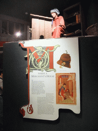 Wax statue in a medieval merchant`s house, with explanation, in Dublinia