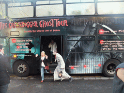 Actor in front of the Gravedigger Ghost Tour bus