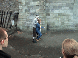 Gravedigger Ghost Tour actor in front of the Kilmainham Gaol museum