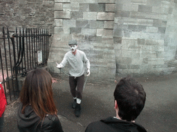 Gravedigger Ghost Tour actor in front of the Kilmainham Gaol museum