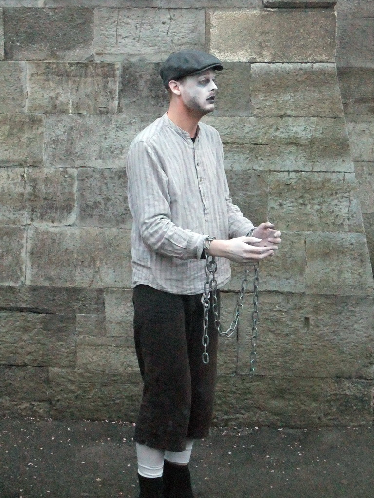 Gravedigger Ghost Tour actor in front of the Kilmainham Gaol museum