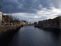 The Ha`penny Bridge over the Liffey river, viewed from the O`Connell Bridge