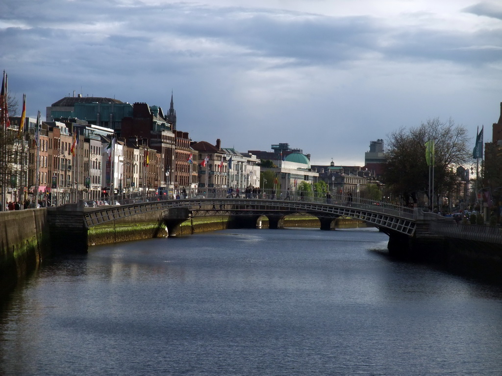 The Ha`penny Bridge over the Liffey river, viewed from the O`Connell Bridge