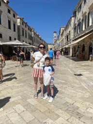 Miaomiao and Max at the Stradun street with the tower of the Franciscan Church