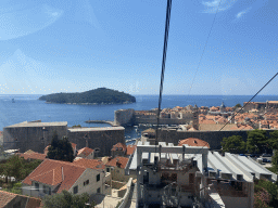 The lower station of the Dubrovnik Cable Car, the Old Town with the Tvrdava Svetog Ivana fortress, the Old Port, the Revelin Fortress, the Dominican Monastery, the Dubrovnik Cathedral and the Church of St. Ignatius and the Lokrum island, viewed from the Dubrovnik Cable Car