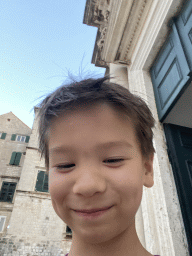 Max in front of the Dubrovnik Cathedral at the Poljana Marina Drica square