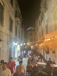 The south side of the iroka Ulica street, viewed from the Ulica od Puca street, by night