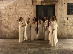 Choir at the Poljana Pasko Milicevica square, by night