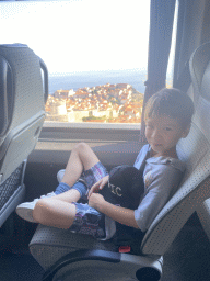 Max at the bus to the Dubrovnik Airport on the Jadranska Cesta road, with a view on the Old Town