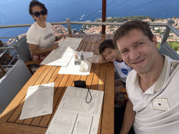Tim, Miaomiao and Max at the terrace of the Restaurant Panorama at Mount Srd, with a view on the Old Town and Fort Lovrijenac
