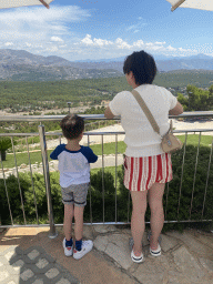 Miaomiao and Max at the terrace of the Restaurant Panorama at Mount Srd, with a view on the hills and mountains to the northeast