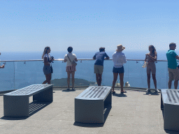 Miaomiao at the viewing platform at the upper station of the Dubrovnik Cable Car at Mount Srd, with a view on the Lokrum island