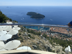 The terrace of the Restaurant Panorama at Mount Srd, the Old Town and the Lokrum island, viewed from the viewing platform at the upper station of the Dubrovnik Cable Car